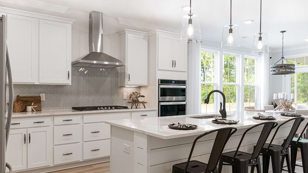 Kitchen at CreeksideAtAndrews by DRB Homes