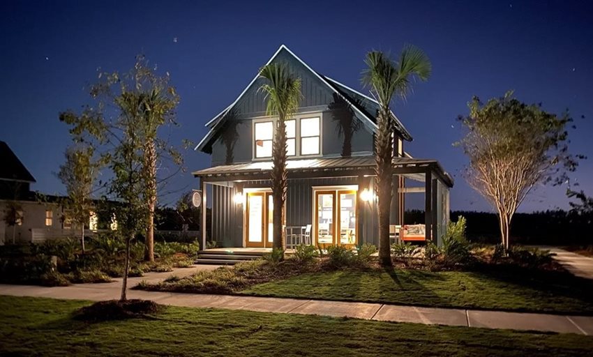Nexton Info Cottage Exterior at Night