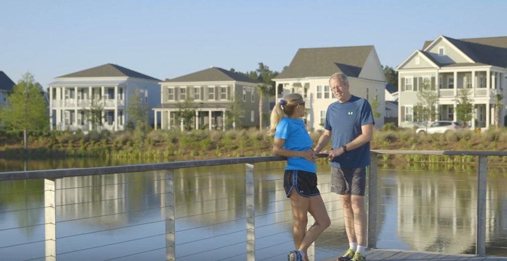Nexton Summerville SC Couple relaxing by pond