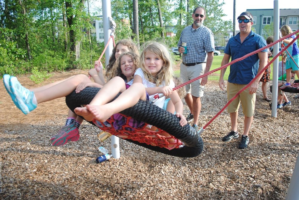 NextonTireSwing.jpg nexton kids on tire swing summerville sc